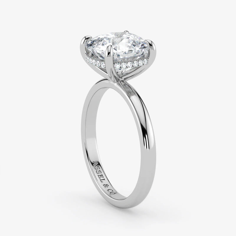 Hidden Halo cushion cut lab-grown diamond engagement ring in Platinum
