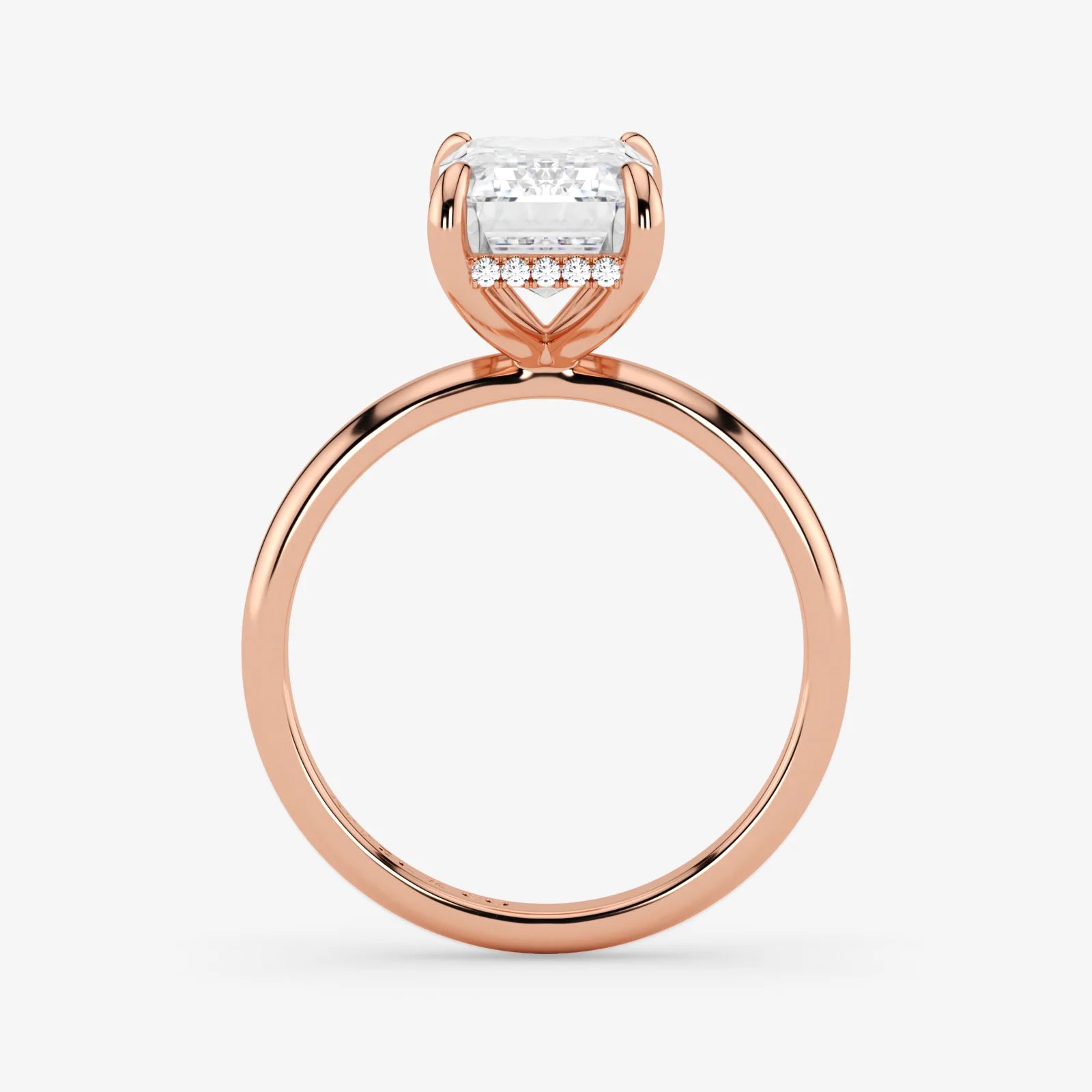 Hidden Halo emerald cut lab-grown diamond engagement ring in 18K Rose Gold.