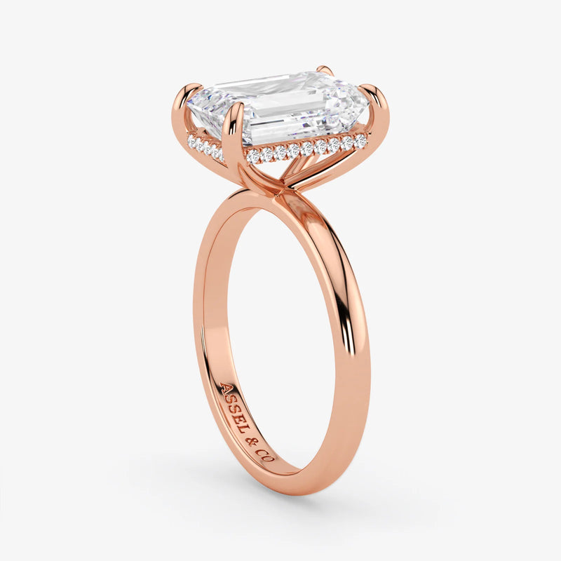 Hidden Halo emerald cut lab-grown diamond engagement ring in 18K Rose Gold