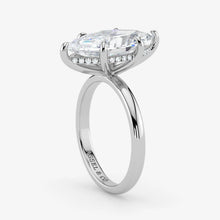 Hidden Halo emerald cut lab-grown diamond engagement ring in 18K White Gold angle