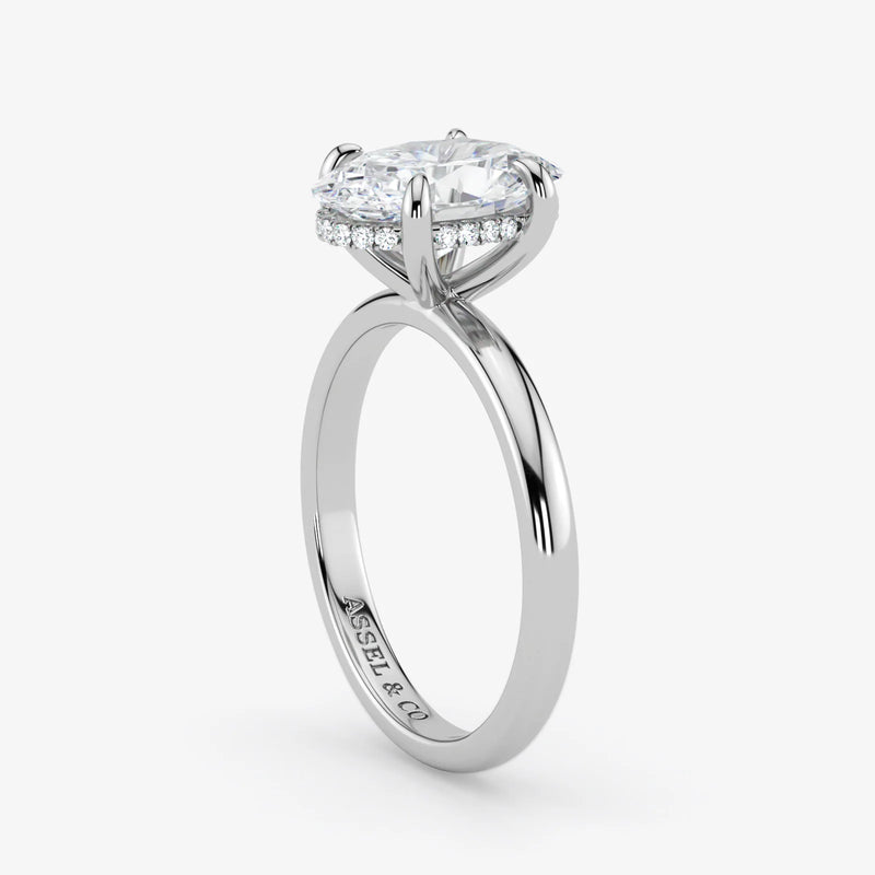 Hidden Halo oval cut lab-grown diamond engagement ring in 18K White Gold