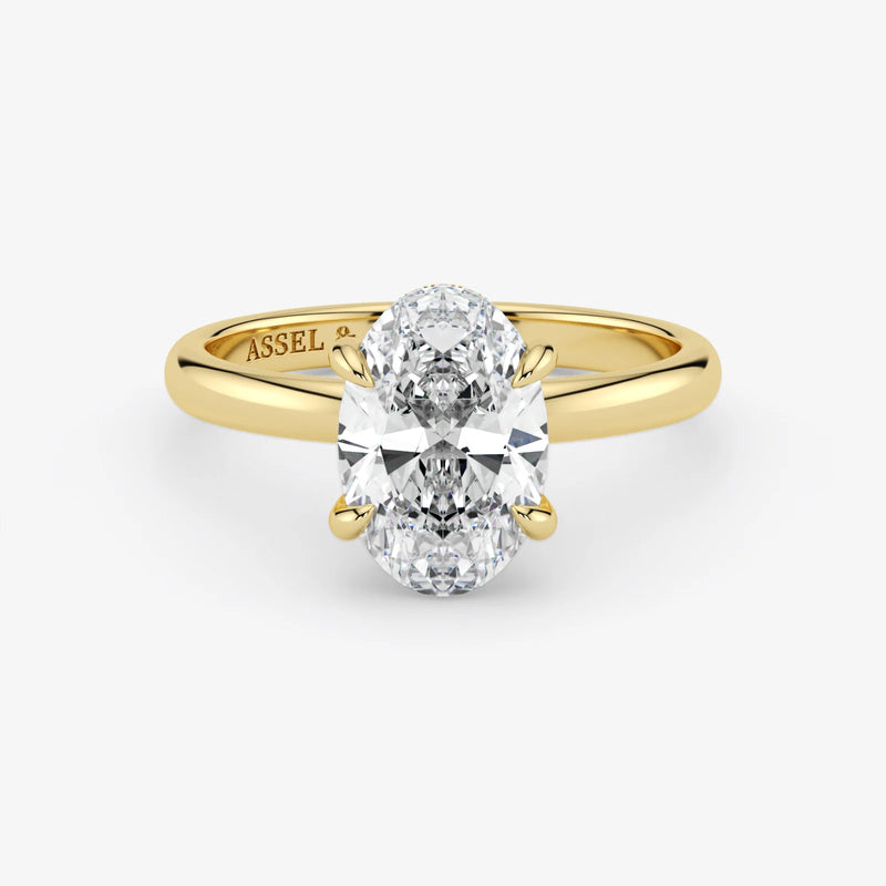 Hidden Halo oval cut lab-grown diamond engagement ring in 18K Yellow Gold