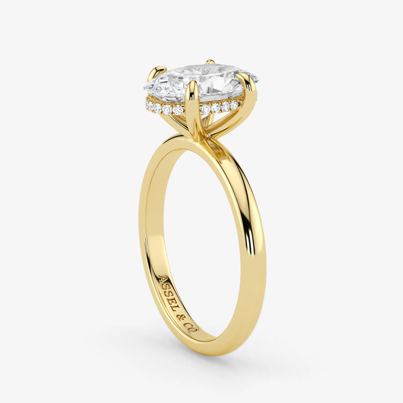 Hidden Halo oval cut lab-grown diamond engagement ring in 18K Yellow Gold