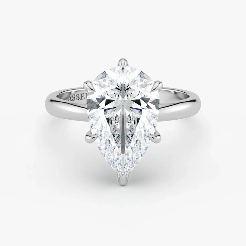 Hidden Halo pear cut lab-grown diamond engagement ring in Platinum