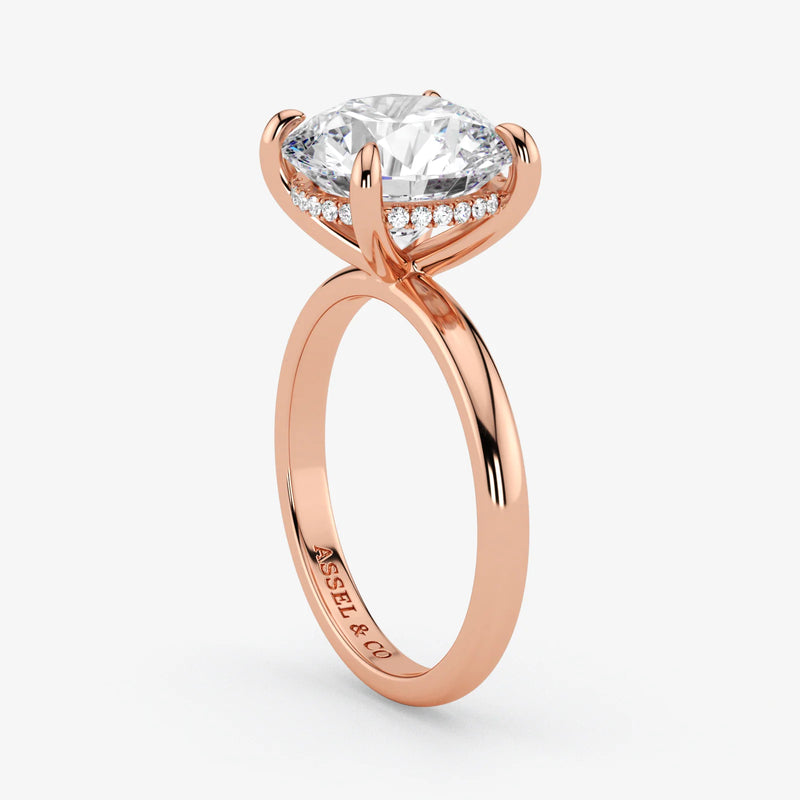 Hidden Halo round cut lab-grown diamond engagement ring in 18K Rose Gold