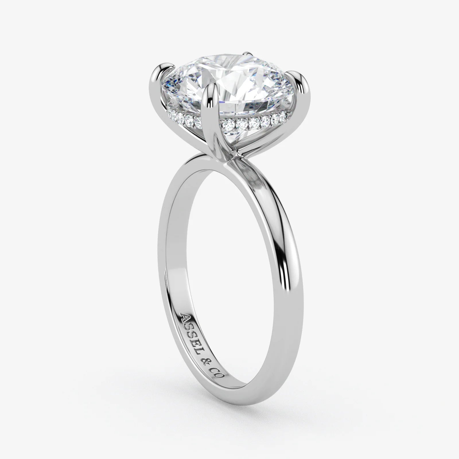 Hidden Halo round cut lab-grown diamond engagement ring in 18K White Gold