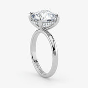 Hidden Halo round cut lab-grown diamond engagement ring in 18K White Gold