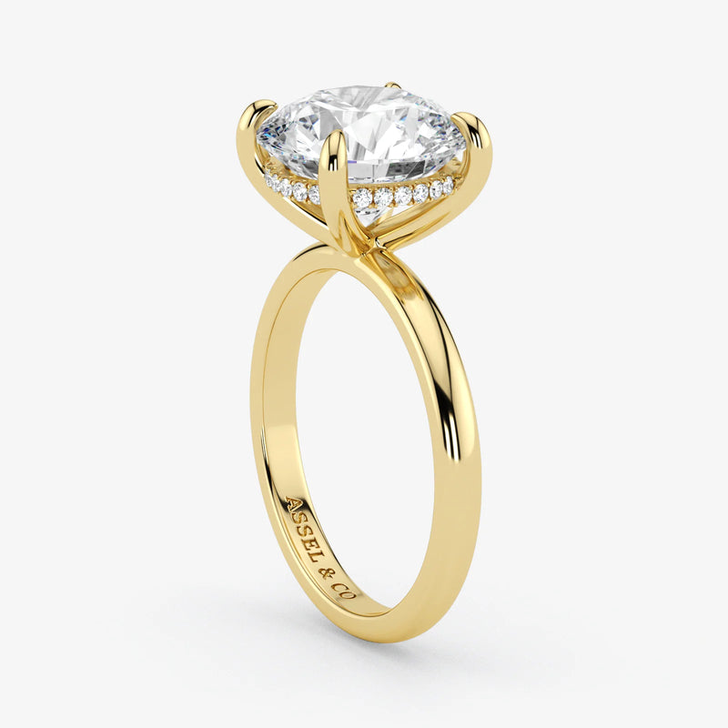 Hidden Halo round cut lab-grown diamond engagement ring in 18K Yellow Gold