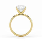 Side view of cushion cut lab-grown diamond ring in yellow gold setting
