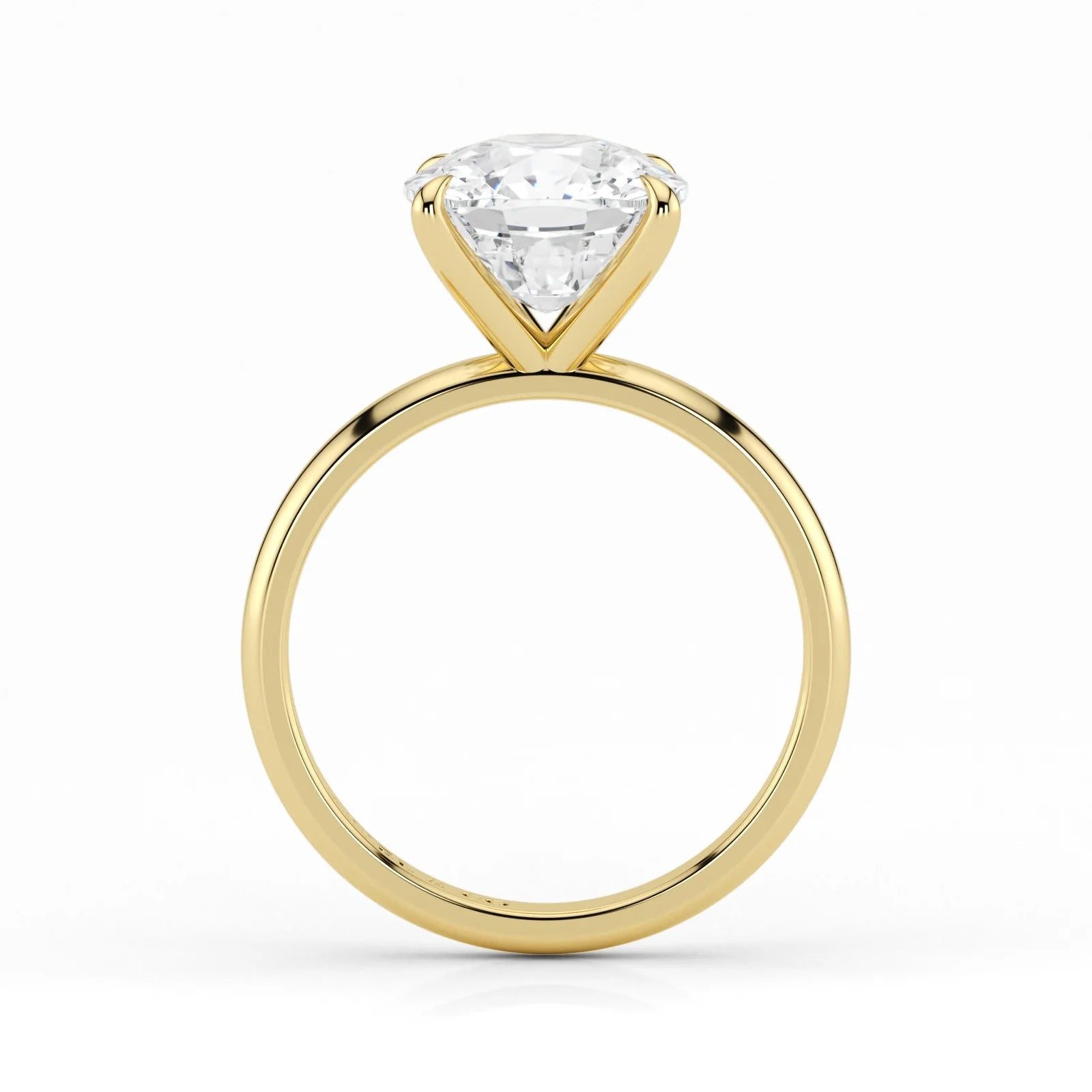 Side view of cushion cut lab-grown diamond ring in yellow gold setting