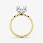 Side profile of cushion cut lab-grown diamond ring with hidden halo in 18K gold