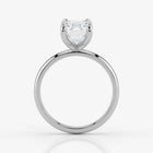 Side profile of emerald cut lab-grown diamond ring in sleek 18K white gold