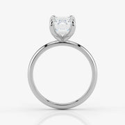 Side profile of emerald cut lab-grown diamond ring in sleek 18K white gold