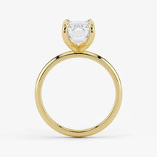 Side profile of emerald cut lab-grown diamond ring in warm 18K yellow gold