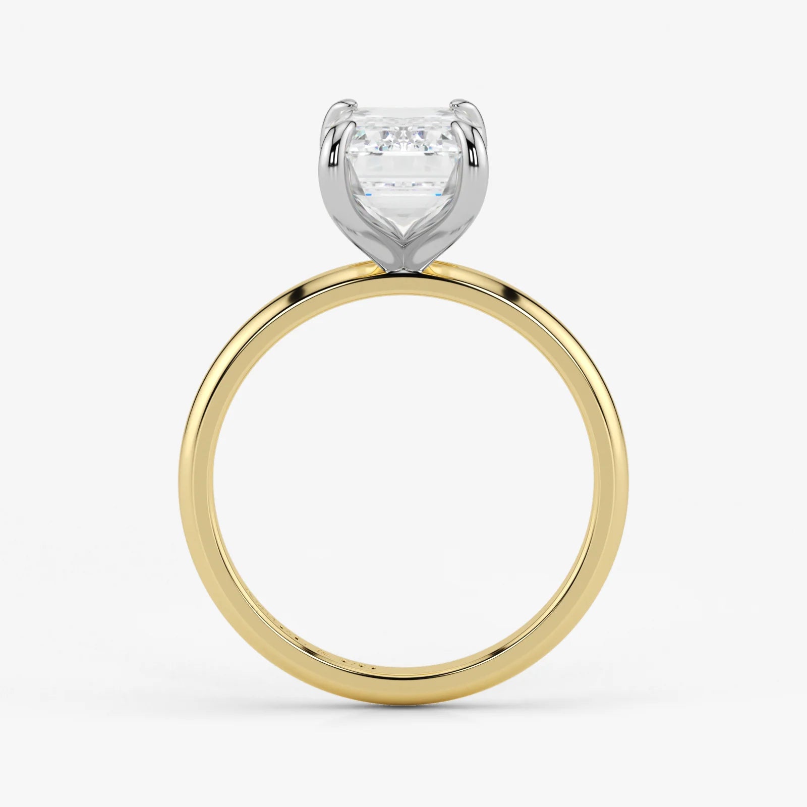 Side profile of emerald cut lab-grown diamond ring with hidden halo in two-tone 18K gold
