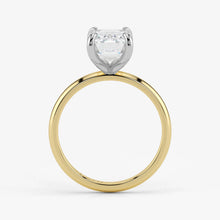 Side profile of emerald cut lab-grown diamond ring with hidden halo in two-tone 18K gold
